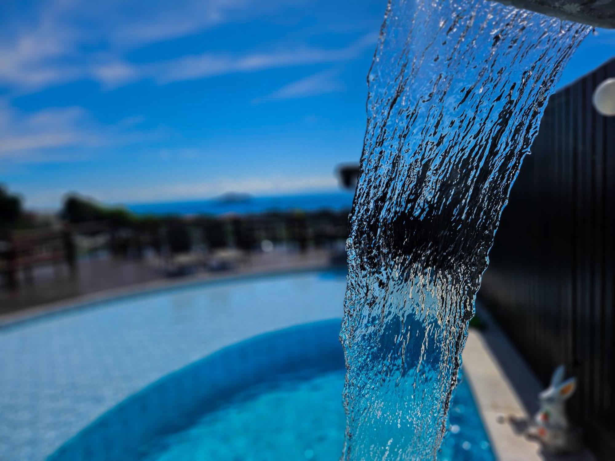 Bella Vista Ocean View Hotel Búzios Exterior foto A shower at a swimming pool